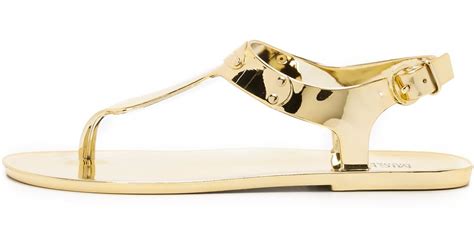 michael kors plate jelly sandals gold|Michael Kors flat thong sandals.